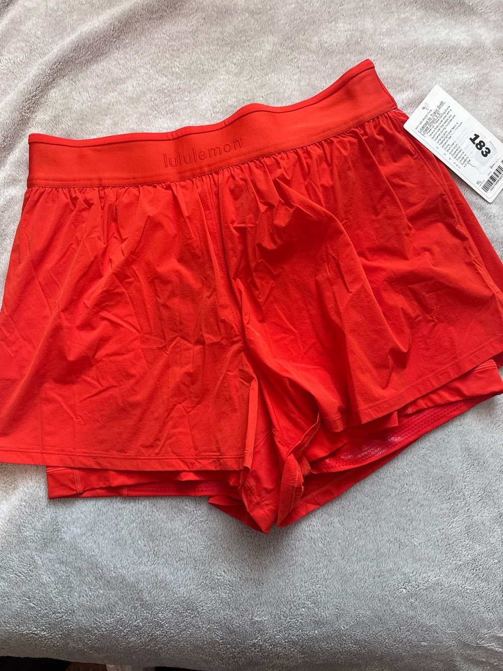 Lululemon License to Train Shorts in Cherry Ember